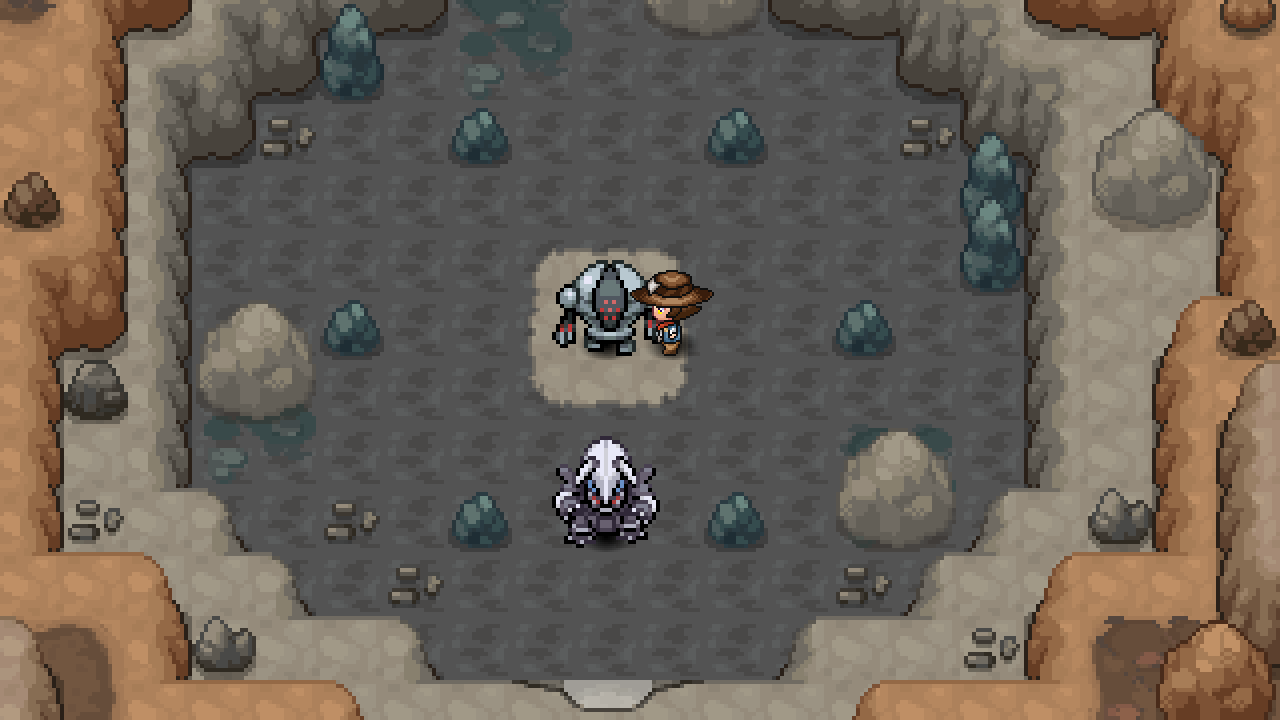 A grey cave floor in Ironheart Cavern with Registeel at the top, the player below it and an Aggron further down.